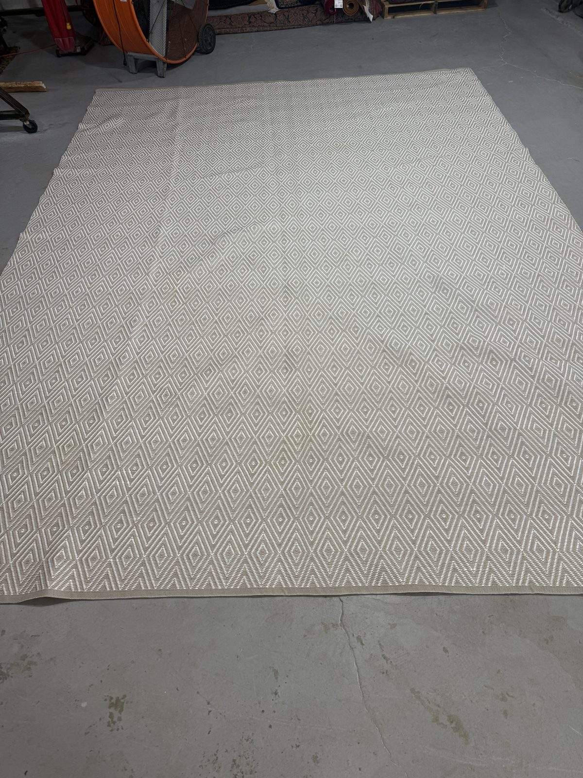 Same diamond flatweave rug after cleaning with every stain removed