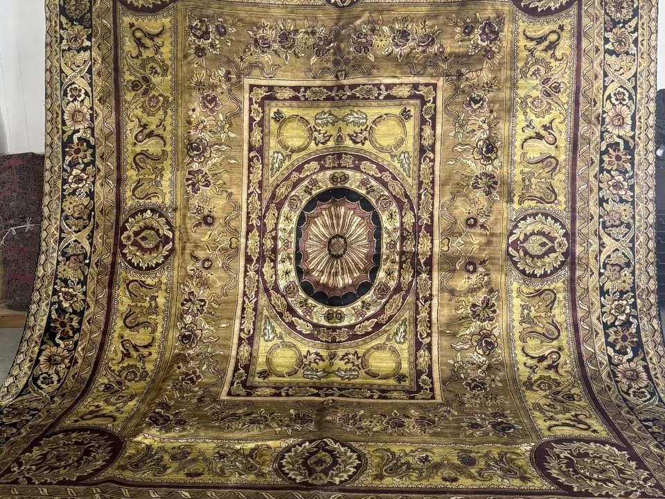 Indian hand-knotted rug showing a floral field in soft wool